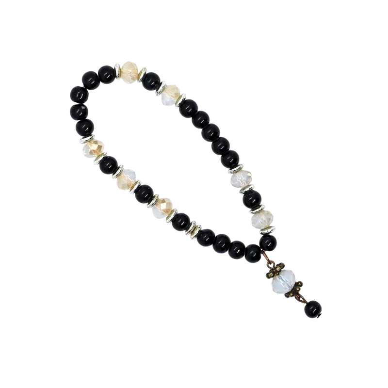 Armband mit schwarzen und transparenten Glasperlen